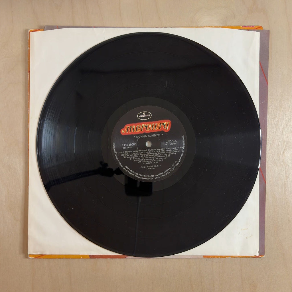 Donna Summer – She Works Hard For The Money – record label