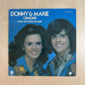 Donny & Marie Osmond – Make The World Go Away – front cover