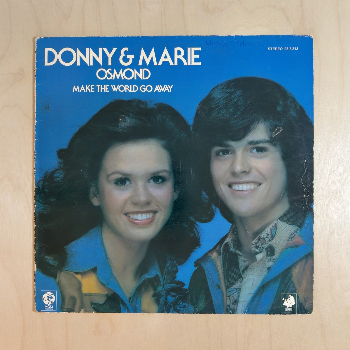 Donny & Marie Osmond – Make The World Go Away – front cover