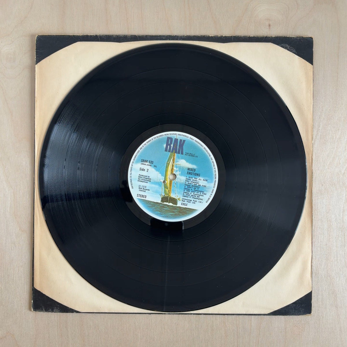 Exile – Mixed Emotions – record label