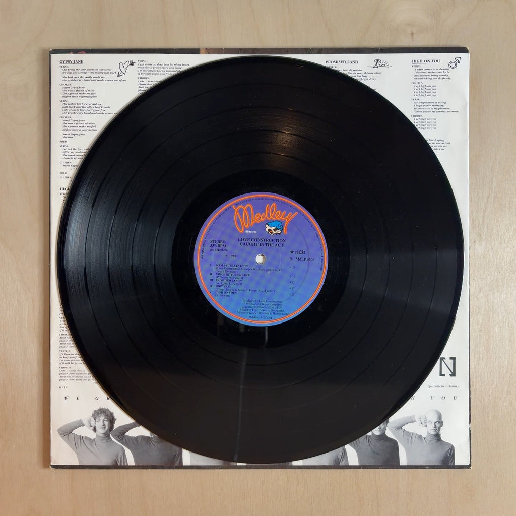 Love Construction – Caught In The Act – record label