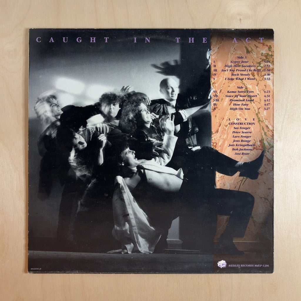 Love Construction – Caught In The Act – back cover